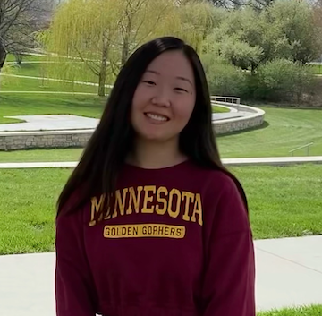 Amelia Blankenau is pictured smiling and wearing a University of Minnesota sweatshirt.