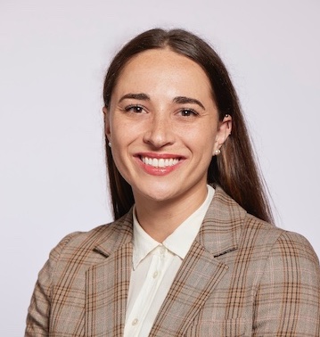 Headshot of Dr. Melissa Ertl smiling while wearing a brown blazer.